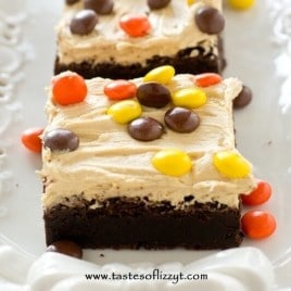 Homemade Reese's Chocolate Peanut Butter Brownies with thick, rich peanut butter frosting and Reese's Pieces. A special treat for chocolate and peanut butter lovers!