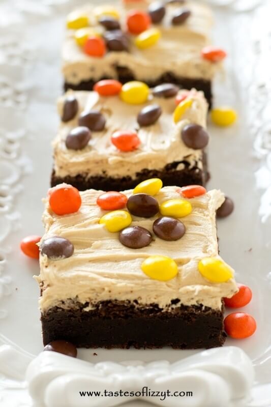 Homemade Reese's Chocolate Peanut Butter Brownies with thick, rich peanut butter frosting and Reese's Pieces. A special treat for chocolate and peanut butter lovers!