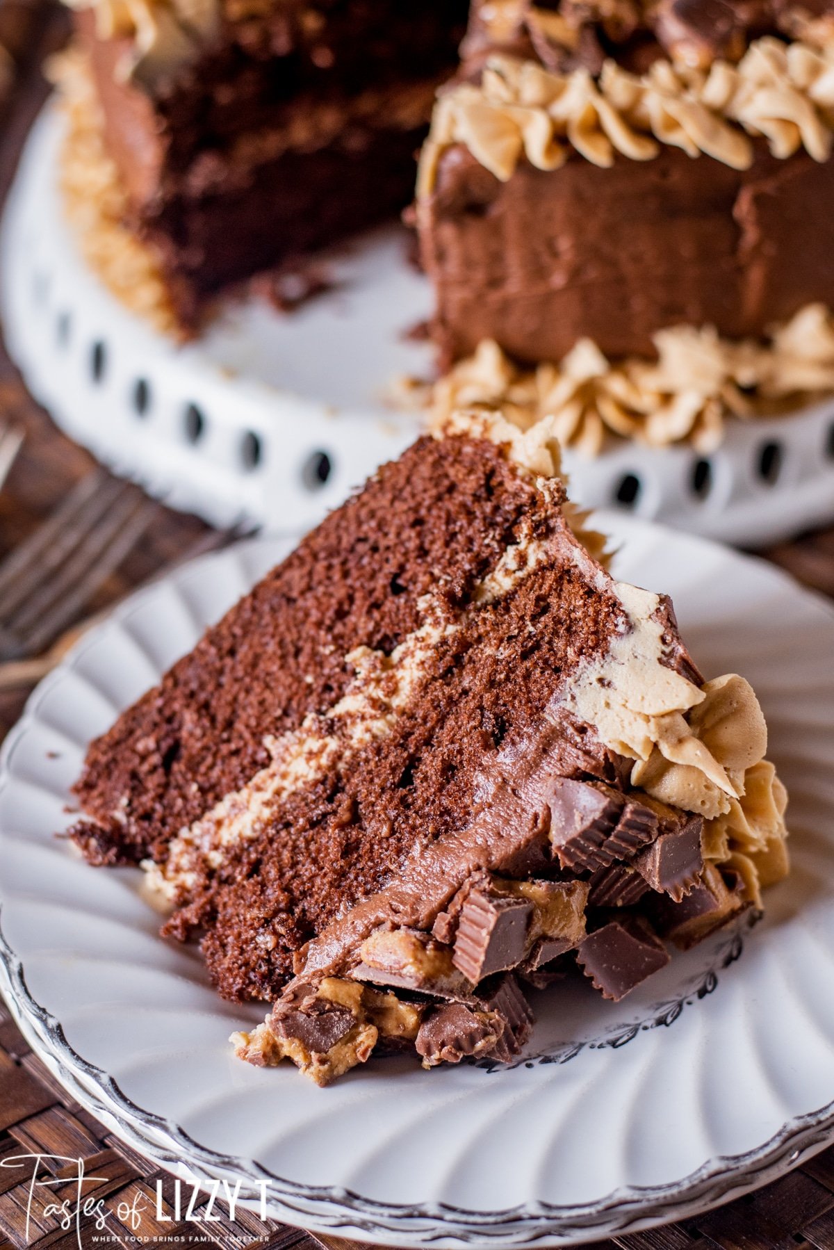 a slice of reese's chocolate peanut butter cake on a plate