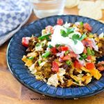 Use crushed tortilla chips and leftover taco meat for this simple Tortilla Chip Mexican Pizza. Serve with fresh salsa and a dollop of sour cream for a quick family meal.