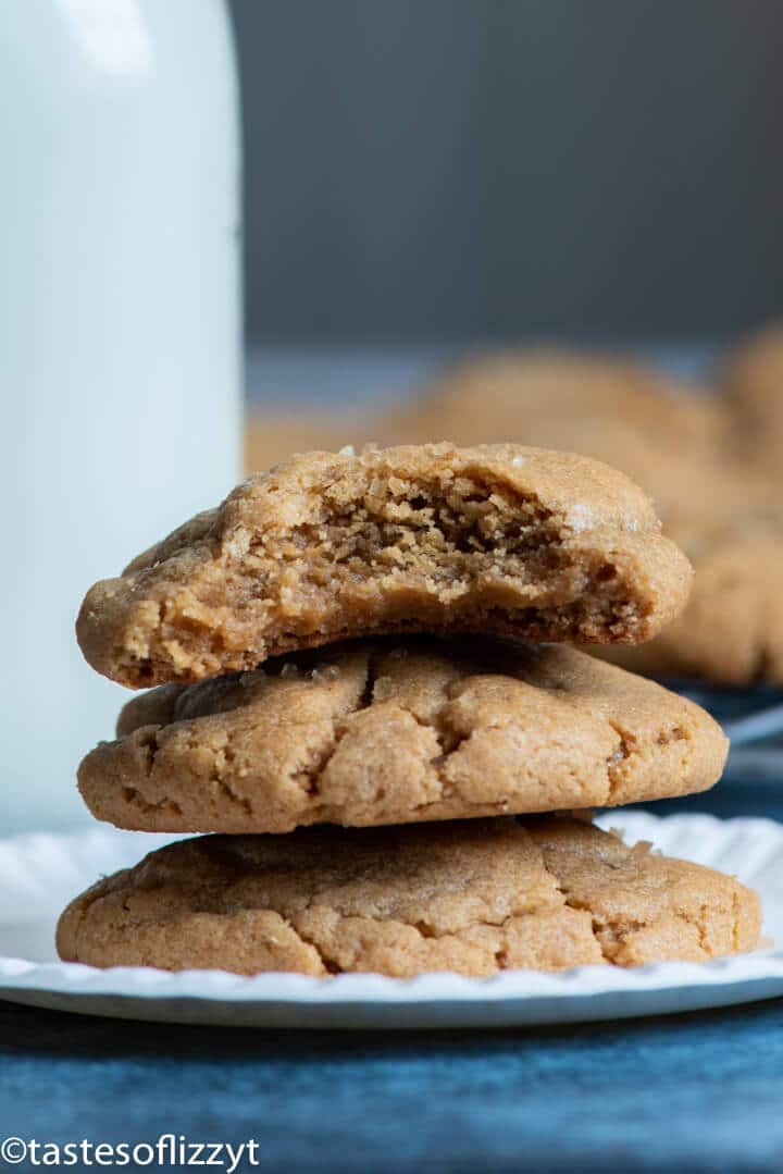 stack of peanut butter cookies with one bite out