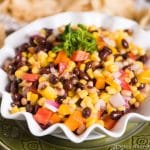 Hillbilly Caviar...an easy pepper, bean, onion, corn side dish that is served with tortilla chips. This is make-ahead recipe great for summer picnics!