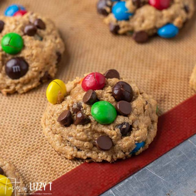 loaded peanut butter M&M monster cookies on a baking sheet