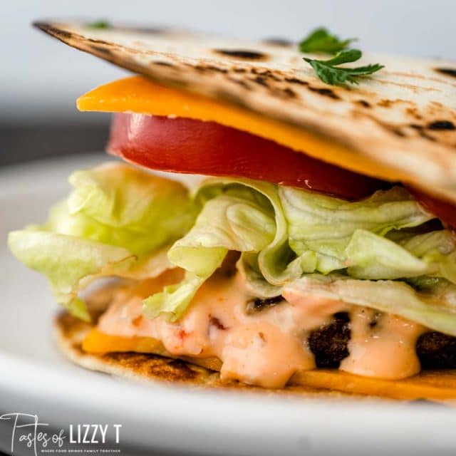 loaded quesadilla burger on a plate