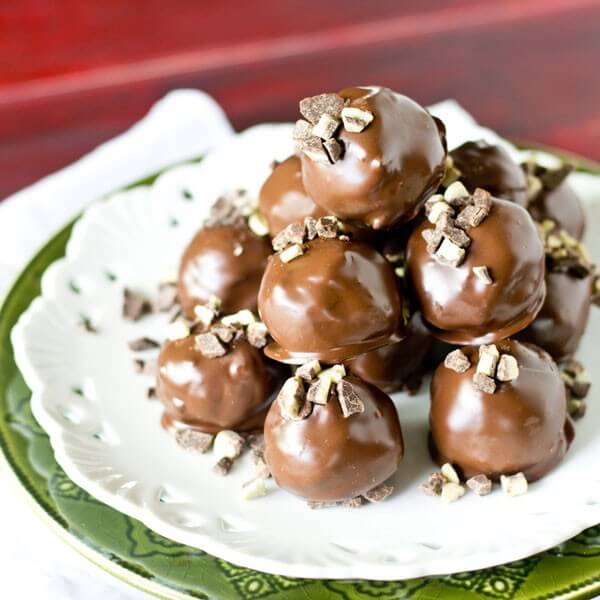 Mint Oreo Truffles stuffed with peppermint patties and Andes mints. Oreo balls with a twist!