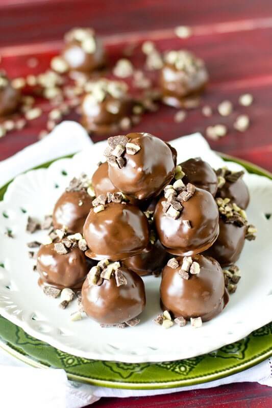 Mint Oreo Truffles stuffed with peppermint patties and Andes mints. Oreo balls with a twist!