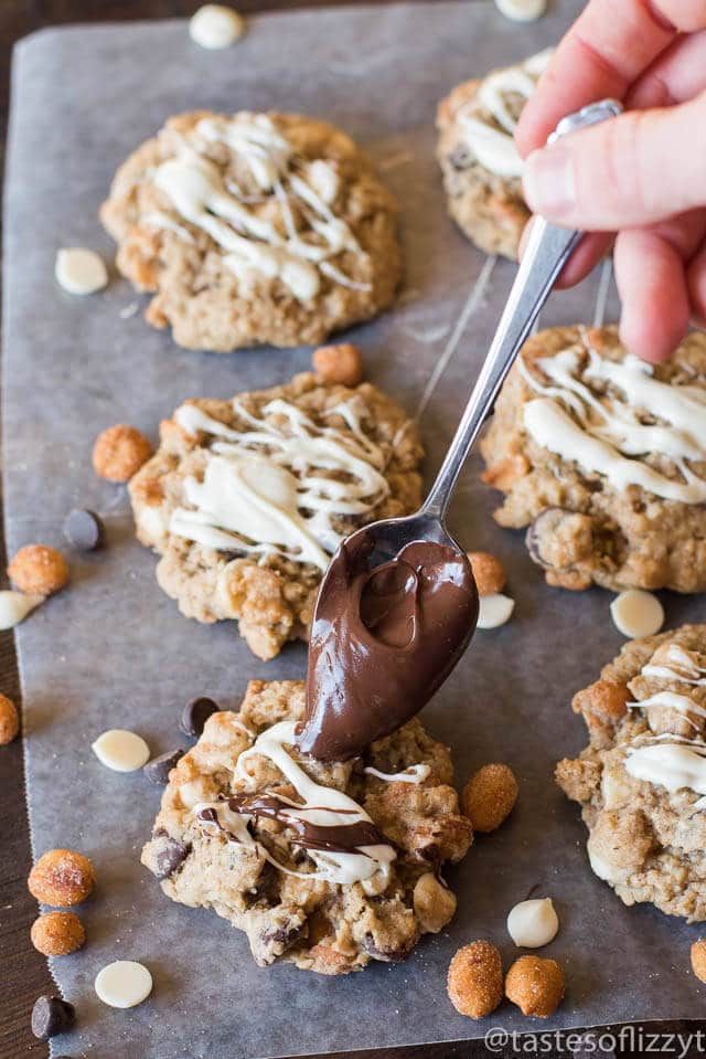 These Honey Roasted Chocolate Oatmeal Cookies are chock full of oatmeal, honey roasted peanuts, chocolate chips, white chocolate chips and a hint of cinnamon.