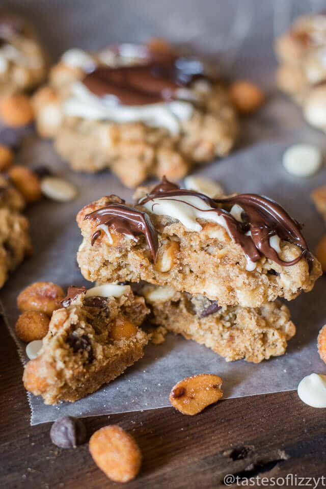 These Honey Roasted Chocolate Oatmeal Cookies are chock full of oatmeal, honey roasted peanuts, chocolate chips, white chocolate chips and a hint of cinnamon.