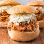 Slow Cooker BBQ Chicken on a bun with coleslaw