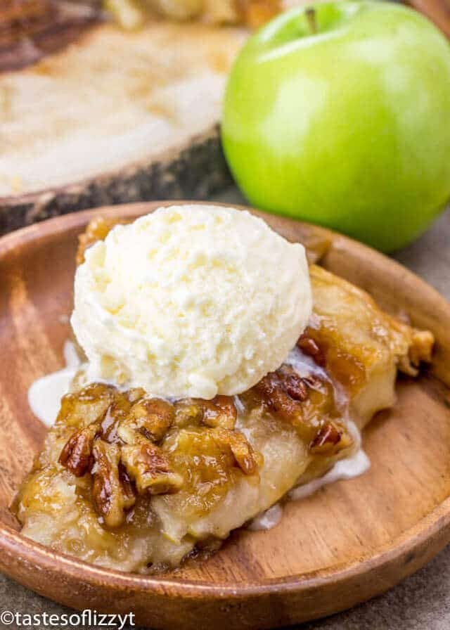 Upside Down Apple Dumpling Pie topped with a scoop of vanilla ice cream