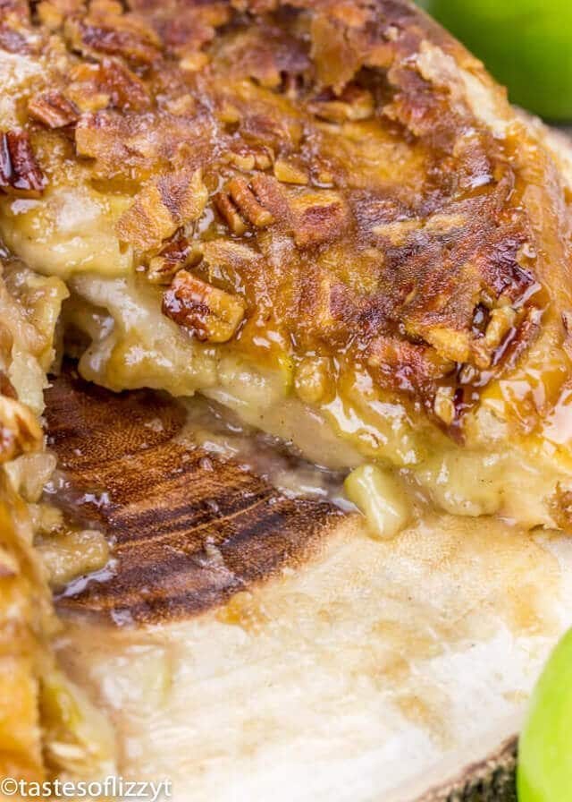 Apple dumpling pie dessert with a slice removed from it