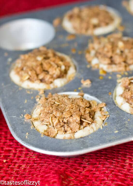 muffin pan full of apple butter pie tarts