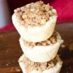 Apple Butter Pie Tarts are idea for gift giving. Perfect bite-size tarts with apple butter filling and an oatmeal streusel topping!