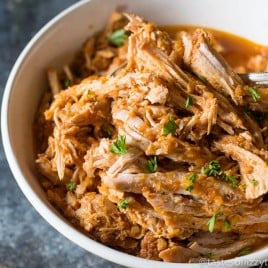 Barbecued Pulled Pork is a classic sandwich. Find out how to make pulled pork a little healthier with this sugar-free homemade barbecue sauce recipe! Fits Paleo and Whole30 diet plans.