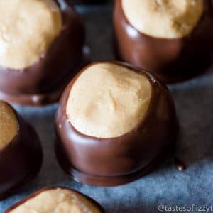 There's a cookie dough surprise inside these chocolate and peanut butter Buckeyes!