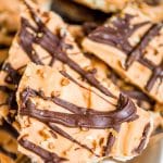 Pumpkin Spice Saltine Toffee uses Pumpkin Spice Hershey Kisses to give a perfect fall flavor to your favorite holiday candy recipe.