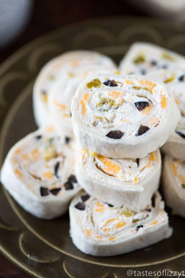 These bite-size Mexican Tortilla Rollups are an easy appetizer to share at a party. Roll up, refrigerate, slice and serve with salsa!