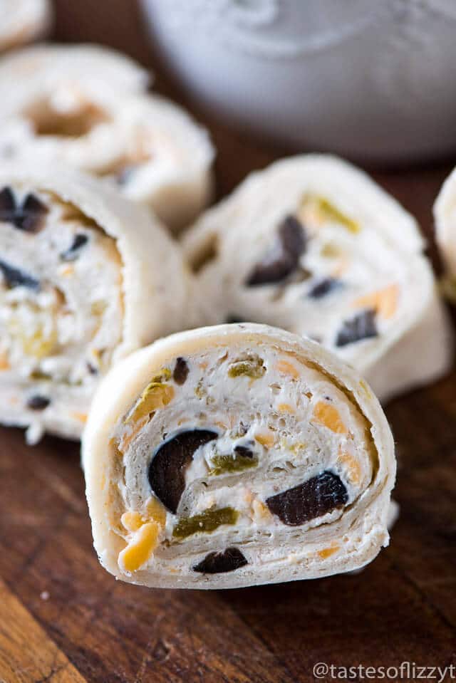 These bite-size Mexican Tortilla Rollups are an easy appetizer to share at a party. Roll up, refrigerate, slice and serve with salsa!