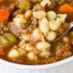 Slow Cooker Pasta e Fagioli is full of veggies, beans, beef and pasta. Come home to a hot, comforting meal! #slowcooker #beef #soup #pasta
