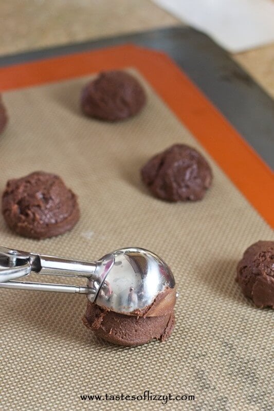 These cookies combine the best of both worlds...brownies and buckeyes! If you love buckeyes, but don't like taking the time to dip them in chocolate, you'll love this easy cookie recipe!