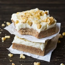 2 Carrot Cake Bars, one with a bite out of it
