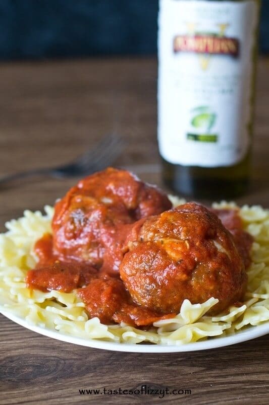 pasta dinner of mozzarella stuffed meatballs with pepperoni pizza sauce over farfalle pasta