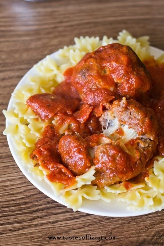 large homemade Italian meatballs stuffed with mozzarella cheese and covered with pepperoni sauce