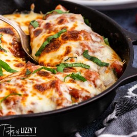 cheesy chicken in a cast iron skillet