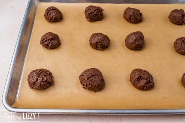 unbaked cookies on a baking sheet
