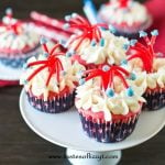 patriotic cupcakes on a cake stand