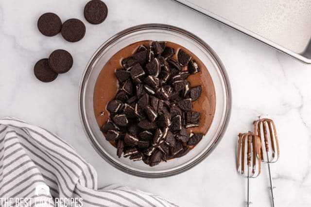 oreos on cake batter in a bowl