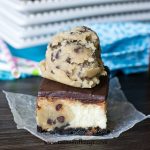 Cookie Dough Cheesecake Bars on wax paper