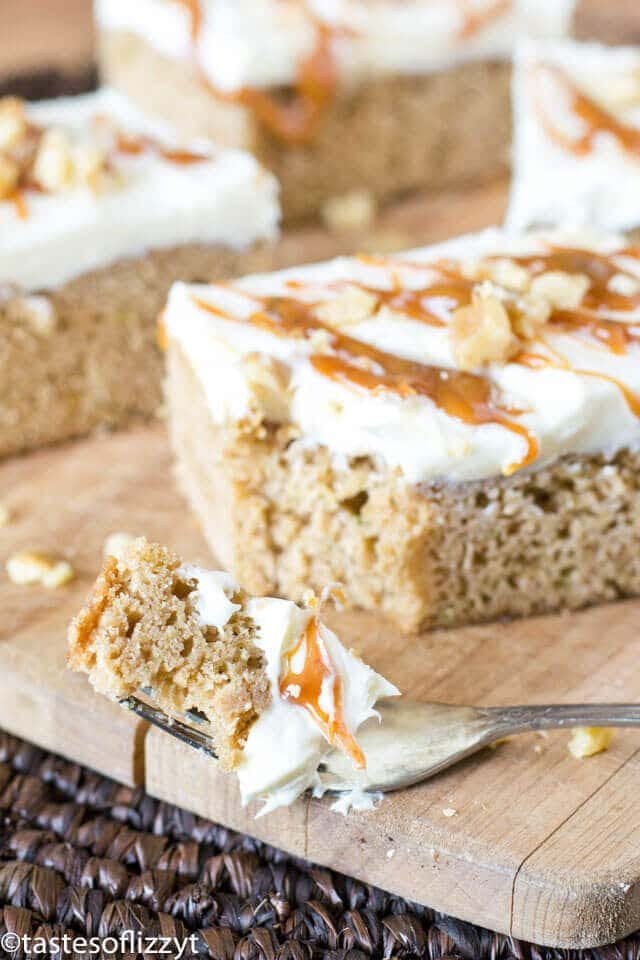 Use up garden zucchini in these simple 5 ingredient Frosted Caramel Zucchini Bars. The caramel cake mix matches perfectly with the cream cheese frosting.