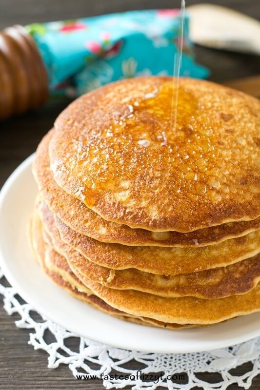 Honey wheat pancakes make a healthy start to your day. Instead of maple syrup, make this simple honey butter syrup for a fun change!