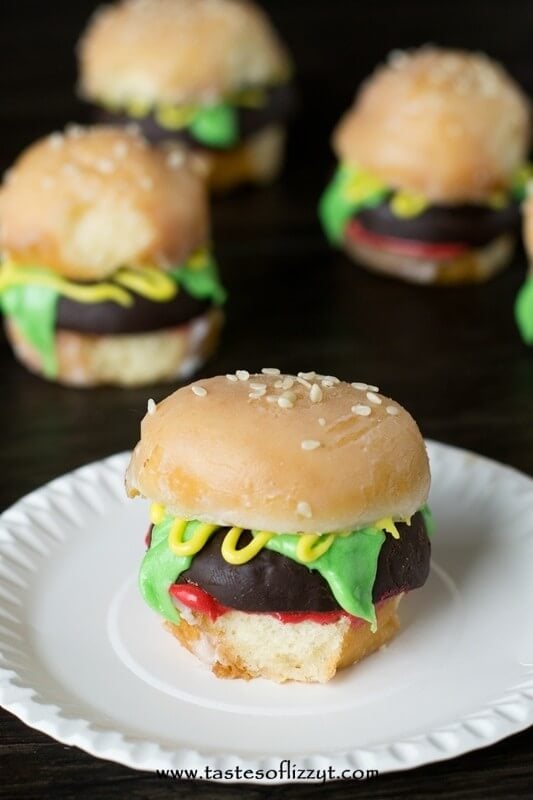 Looking for a cute breakfast idea? Make these mini Donut burgers out of glazed and chocolate covered donut holes.