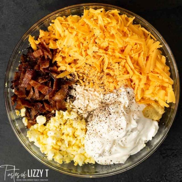 ingredients for bacon egg salad in a bowl