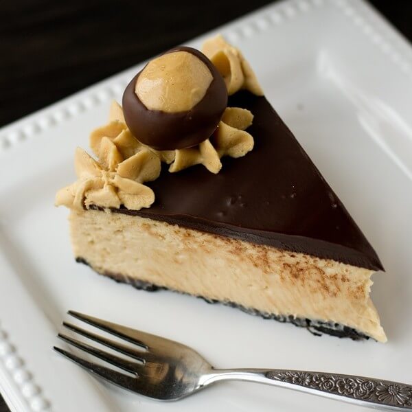 peanut butter cheesecake on a plate with a fork