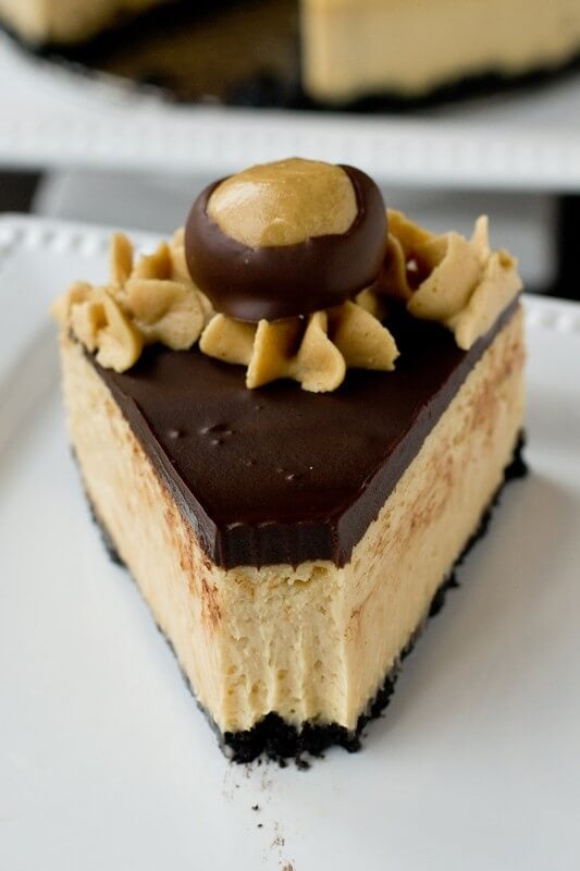 Rich, creamy peanut butter cheesecake topped with sweet chocolate ganache and and an Oreo cookie crust.