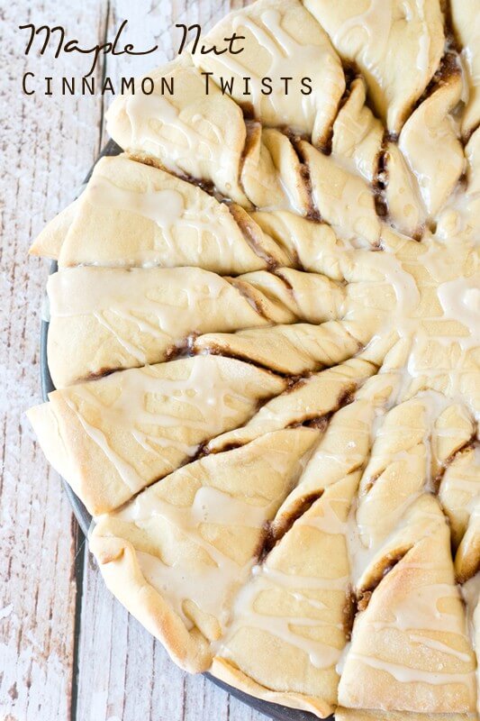 Impress your friends with these Maple Nut Cinnamon Twists. Sweet dough is filled with a brown sugar, cinnamon-nut spread and drizzled with maple glaze. 