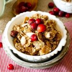 Oatmeal Brown Sugar Granola in a bowl with cranberries