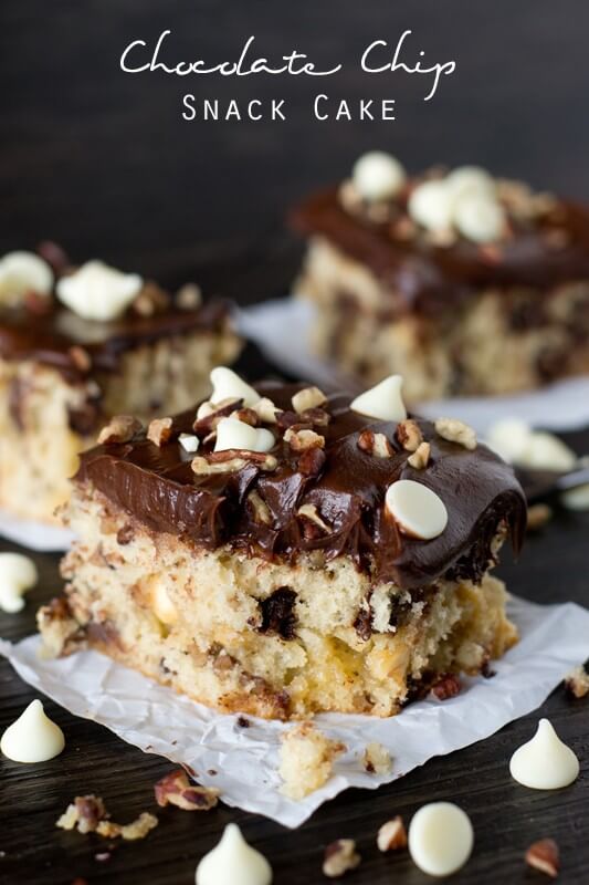 Cookie batter cake is full of white chocolate, semi-sweet chocolate chips, nuts and topped with chocolate frosting. Kids and adults will love this Chocolate Chip Cookie Cake!