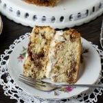 cream filled cinnamon cake on a plate