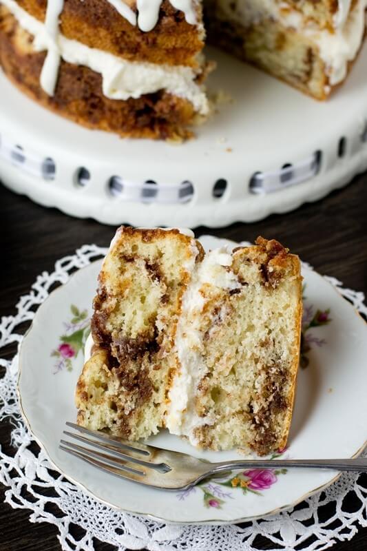 Sweet cream filling between layers of cinnamon infused coffee cake