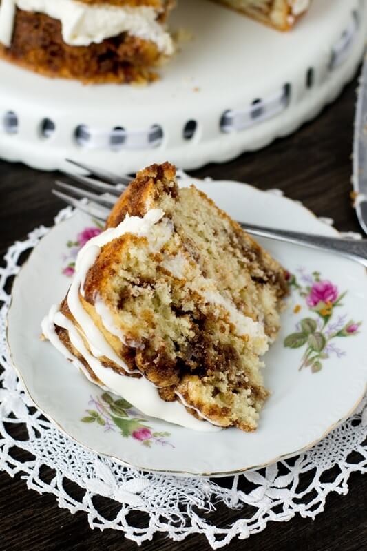 Sweet cream filling between layers of cinnamon infused coffee cake