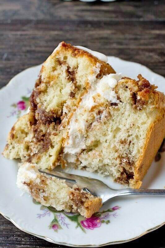 cinnamon layered coffee cake on a plate with a fork