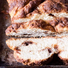 Panera has nothing on this bread recipe! Soft, homemade bread makes up the base of this cinnamon crunch braided bread. Homemade cinnamon chips fill the inside and it’s topped with a cinnamon crunch streusel.