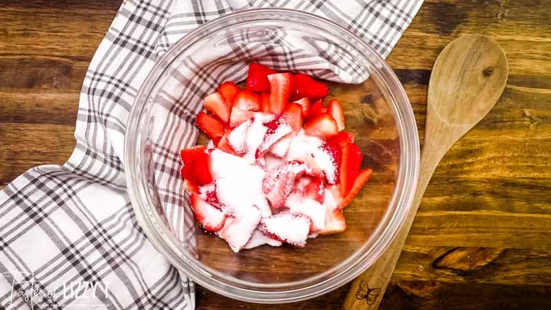 sugar and strawberries in a bowl