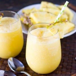 Sweet, creamy and tangy, this Pineapple Cream Tropical Smoothie with pineapple and a hint of orange is sure to refresh you on a hot summer day. It's dairy free and has no added sugar!