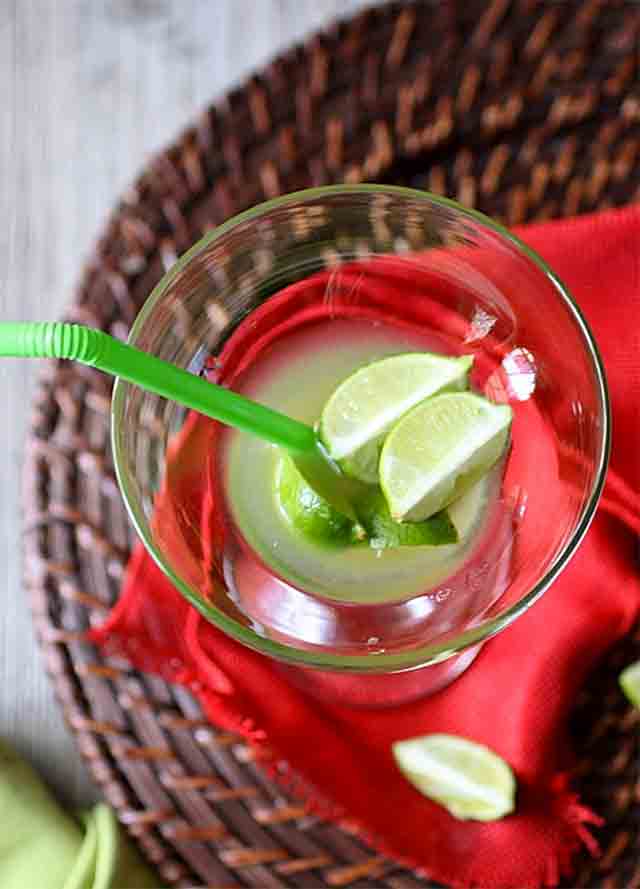 glass with limes in it