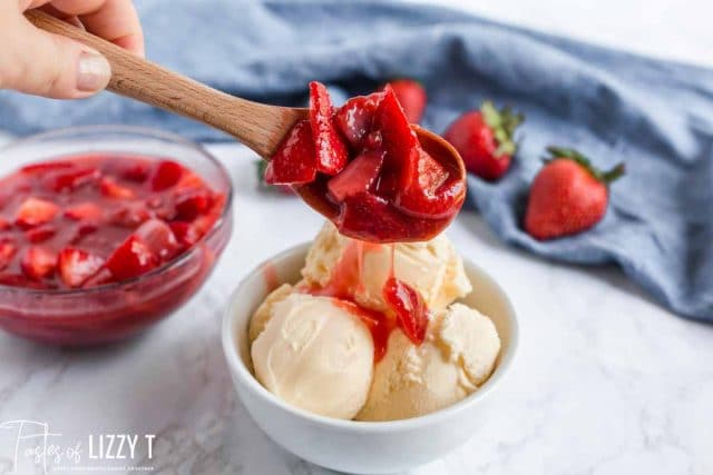 homemade strawberry topping over ice cream